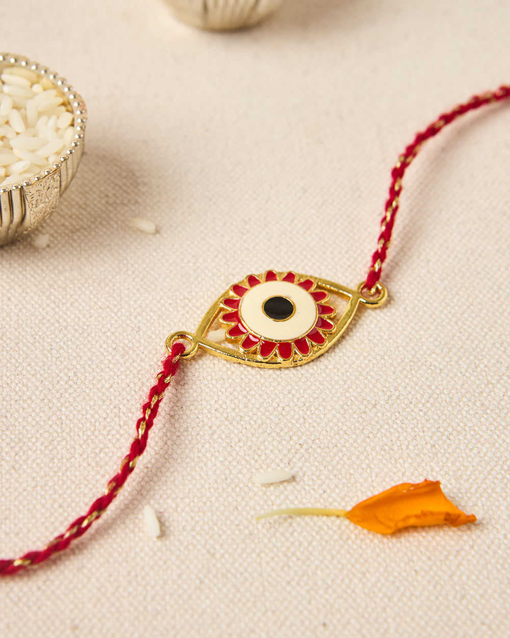 Evil-Eye Red Rakhi - Brass Motif