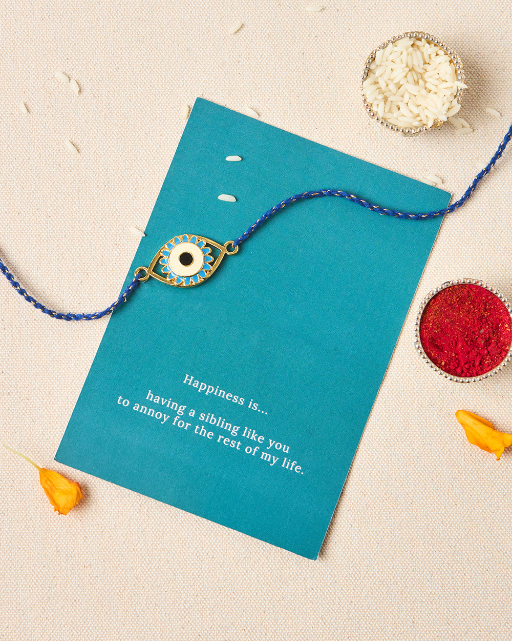 Evil-Eye Blue Rakhi - Brass Motif