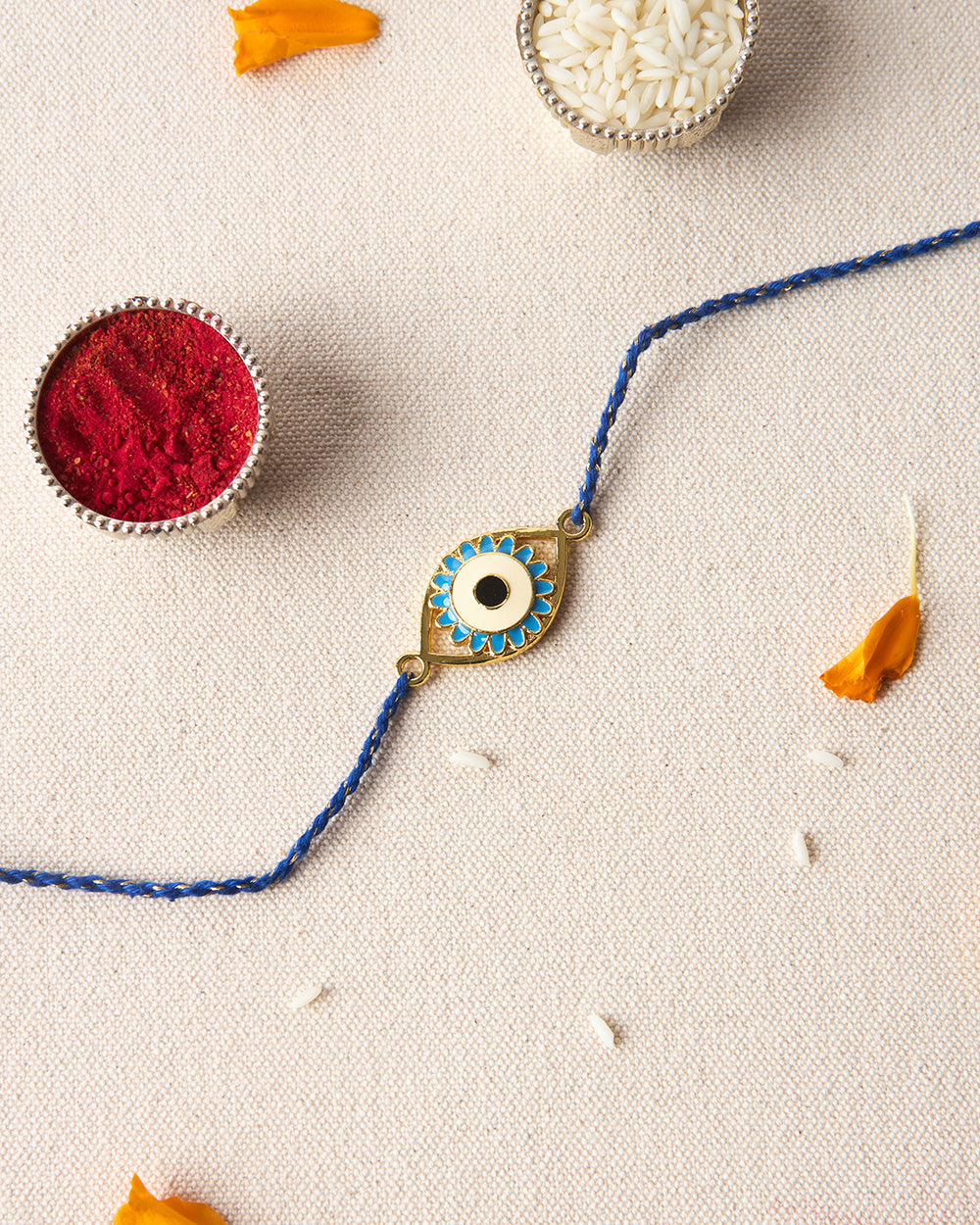 Evil-Eye Blue Rakhi - Brass Motif